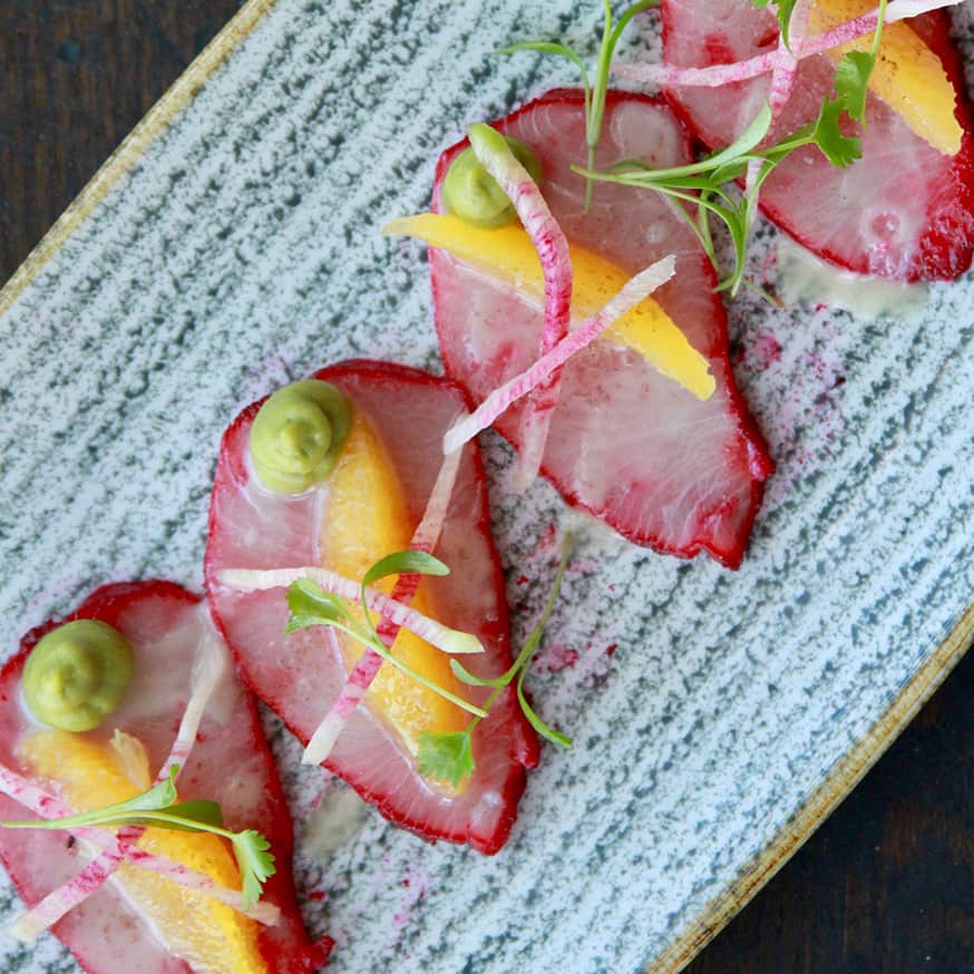 Seasonal vegetable appetizer with pickled radishes and cilantro at The Kitchen restaurant in Jackson, Wyoming.