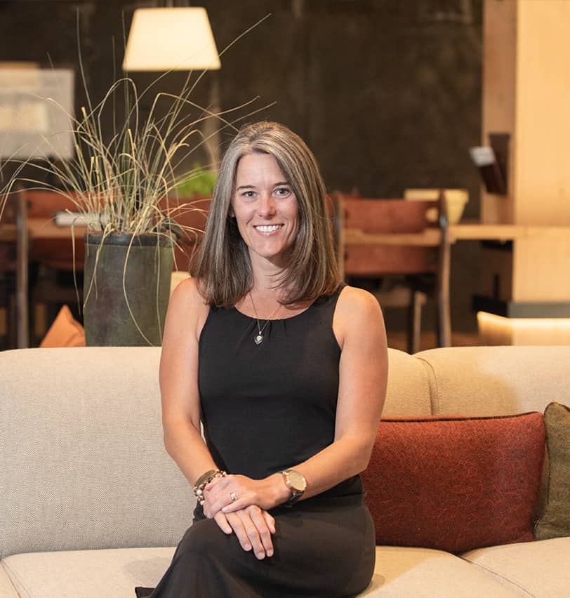 Portrait of Fine Dining Restaurant Group Chief Financial Officer, Britta Farren, in the lobby of a Fine Dining restaurant in Jackson Hole, Wyoming.