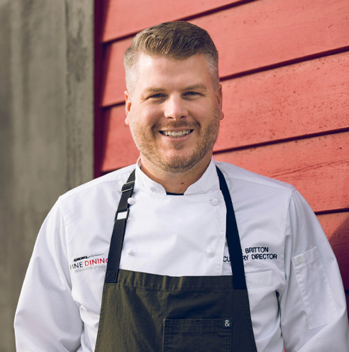 Portrait of Fine Dining Restaurant Group VP of Culinary Michael Britton.