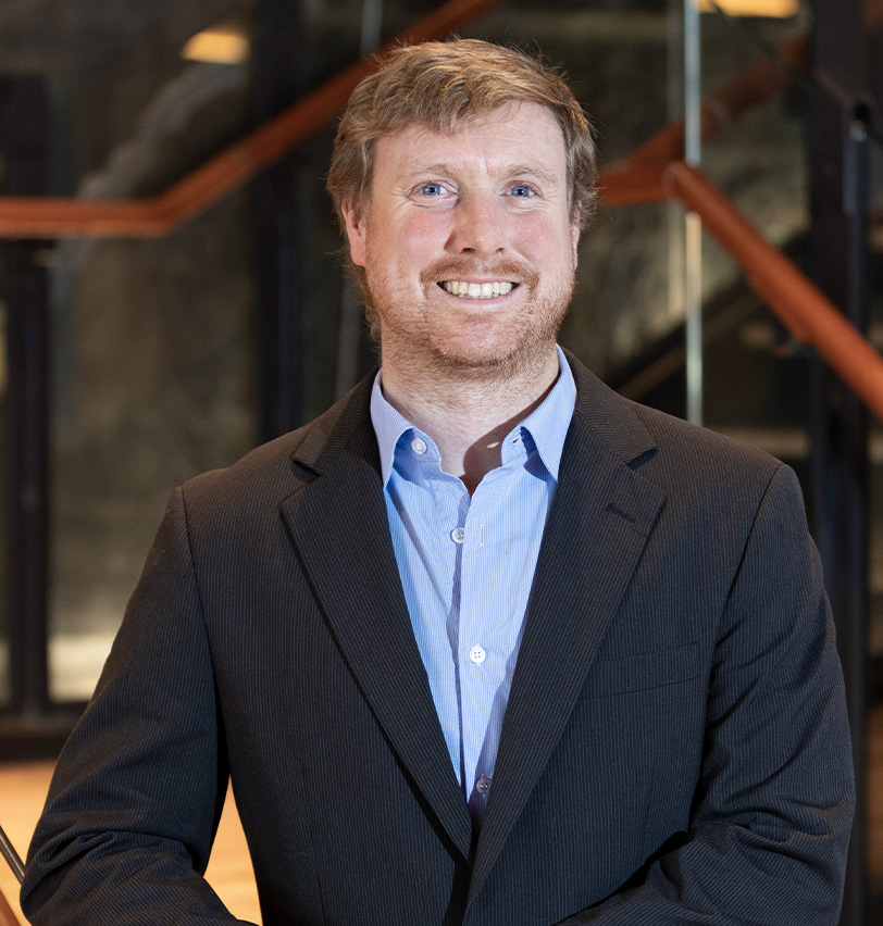 Portrait of Fine Dining Restaurant Group’s Vice President of Business Development, Park Dunn-Morrison, standing outside a Fine Dining restaurant in Jackson Hole.