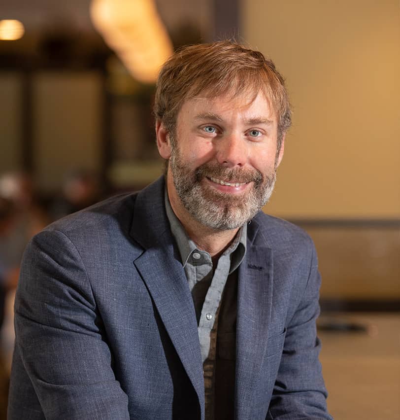 Portrait of Fine Dining Restaurant Group Chief Operating Officer, Justin Henry in the lobby of The Bistro restaurant in Jackson, Wyoming.