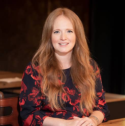 Portrait of Fine Dining Restaurant Group’s Director of Communications, Kendra Alessandro, at The Bistro in Jackson, Wyoming.