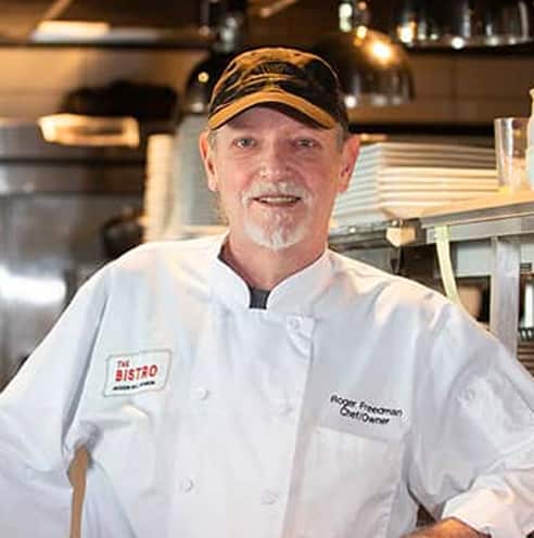 Portrait of Fine Dining Restaurant Group co-founder and owner Roger Freedman in the kitchen of The Bistro in Jackson, Wyoming.